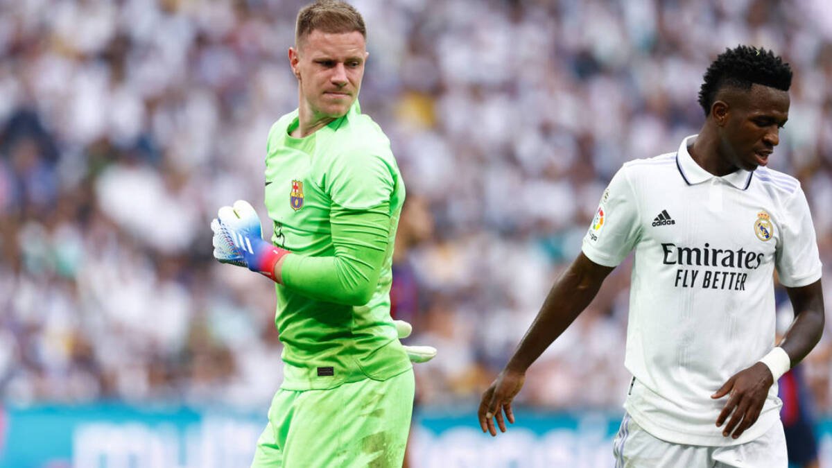 Ter Stegen y Vinicius durante un Clásico.