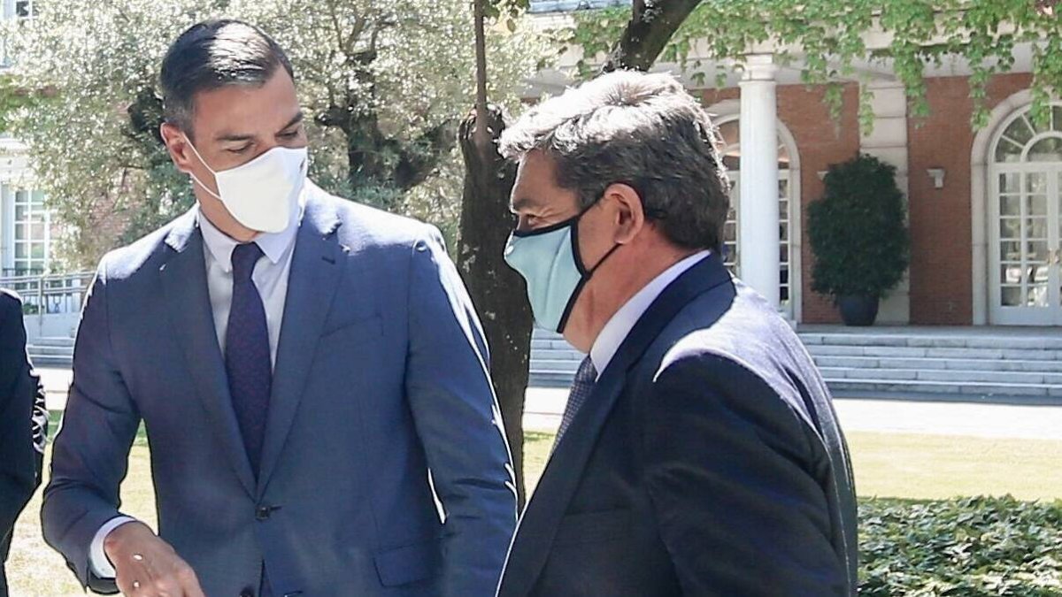 Pedro Sánchez y José Luis Escrivá
