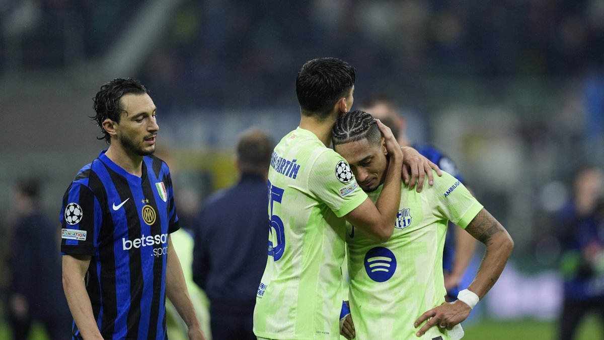 Gerard Martin y Raphinha, desolados en Milán