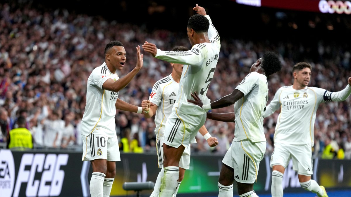 MADRID, SPAIN - OCTOBER 26: Kylian Mbappe of Real Madrid celebrates scoring his team's first goal with teammates Arda Gueler, Jude Bellingham and Vinicius Junior during the LaLiga EA Sports match between Real Madrid CF and FC Barcelona at Estadio Santiago Bernabeu on October 26, 2025 in Madrid, Spain. (Photo by Angel Martinez/Getty Images)