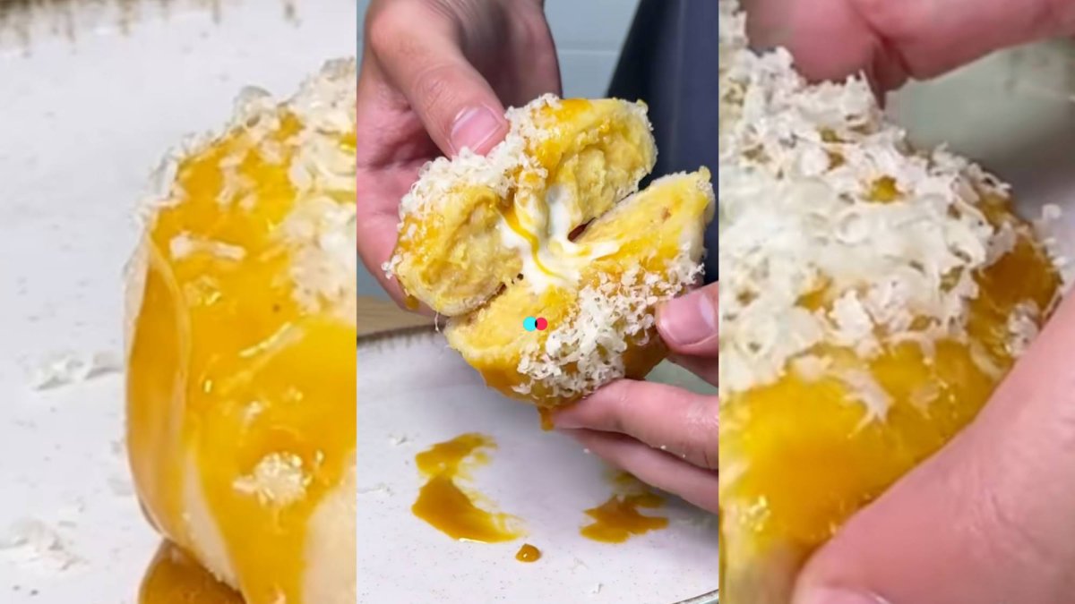 El donut de tortilla de Iñaki Gastro combina la textura crujiente de la tempura con un interior jugoso de tortilla y un glaseado brillante de yema curada, coronado con queso rallado. Un bocado visualmente irresistible.