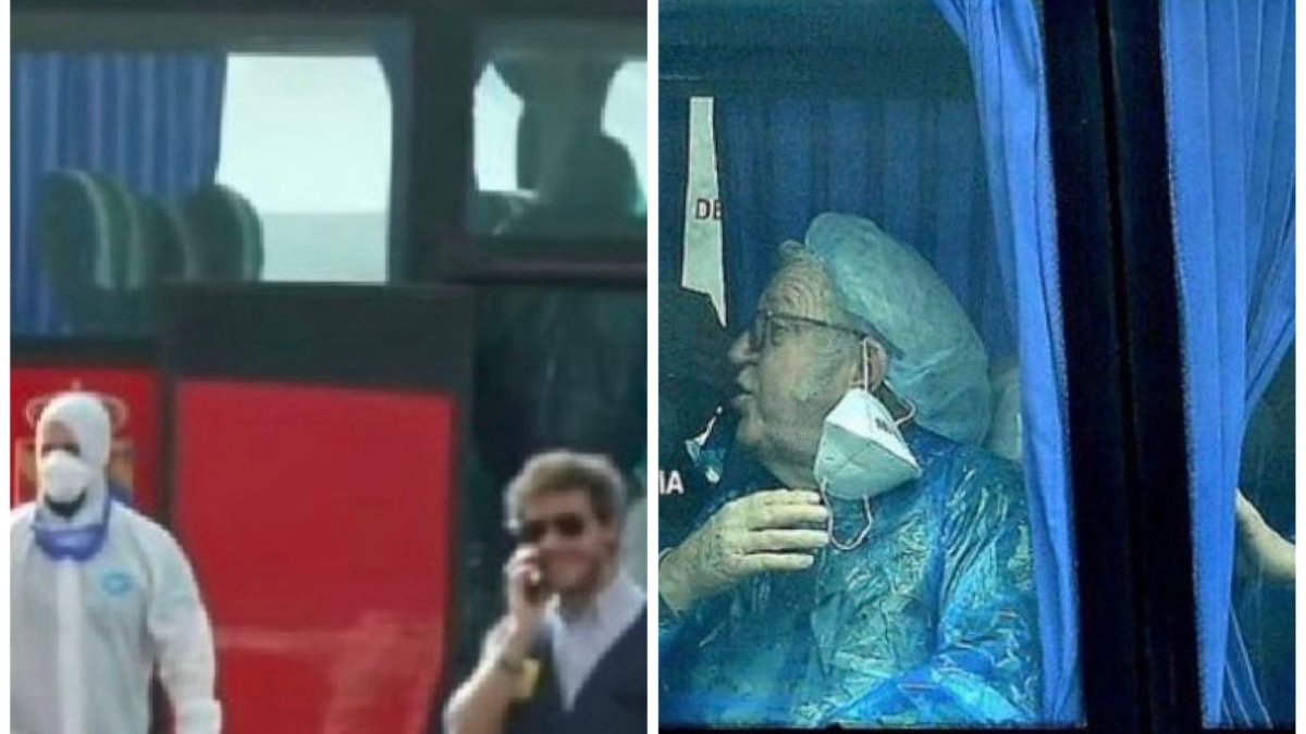 Un hombre charla sin protección junto a otro con EPI y el autobús de pasajeros del crucero con hantavirus abierto y otro se quita la mascarilla en el bus