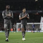 Rudiger y Bellingham, con rostro triste tras la derrota del Real Madrid en Londres.