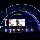 WASHINGTON, DC - DECEMBER 05: Draw assistant Tom Brady, Draw assistant Shaquille O’Neal, Co-Conductor Samantha Johnson, FIFA Legend Rio Ferdinand, Draw assistant Aaron Judge and Draw assistant Wayne Gretzky stand on stage as the groups are presented on the screen during the FIFA World Cup 2026 Official Draw at John F. Kennedy Center for the Performing Arts on December 05, 2025 in Washington, DC. (Photo by Kevin Dietsch/Getty Images)