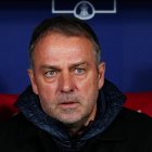MADRID, SPAIN - FEBRUARY 12: Hansi Flick, Head Coach of FC Barcelona, looks on prior to the Copa Del Rey Semi-Final First Leg match between Atletico de Madrid and FC Barcelona at Riyadh Air Metropolitano on February 12, 2026 in Madrid, Spain.  (Photo by Angel Martinez/Getty Images)