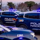 Archivo - Coches de la Policía Nacional.
