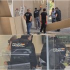 Operarios colocan maderas en la fachada del Lefties y la Policía Nacional visitando una tienda de helados